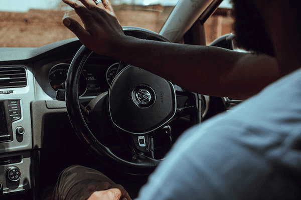 a man driving a car