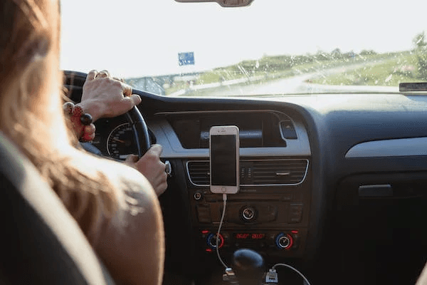 a woman driving a car